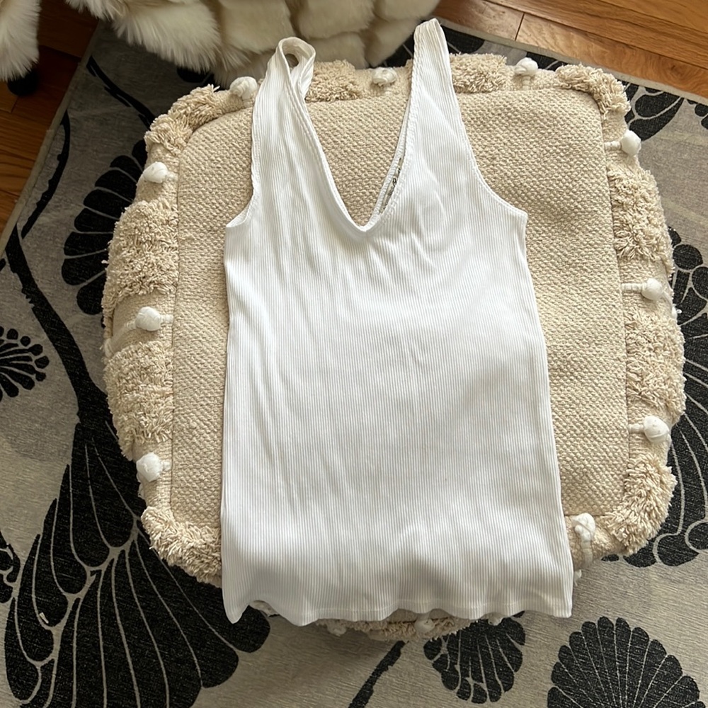 Express size small v neck white tank top.